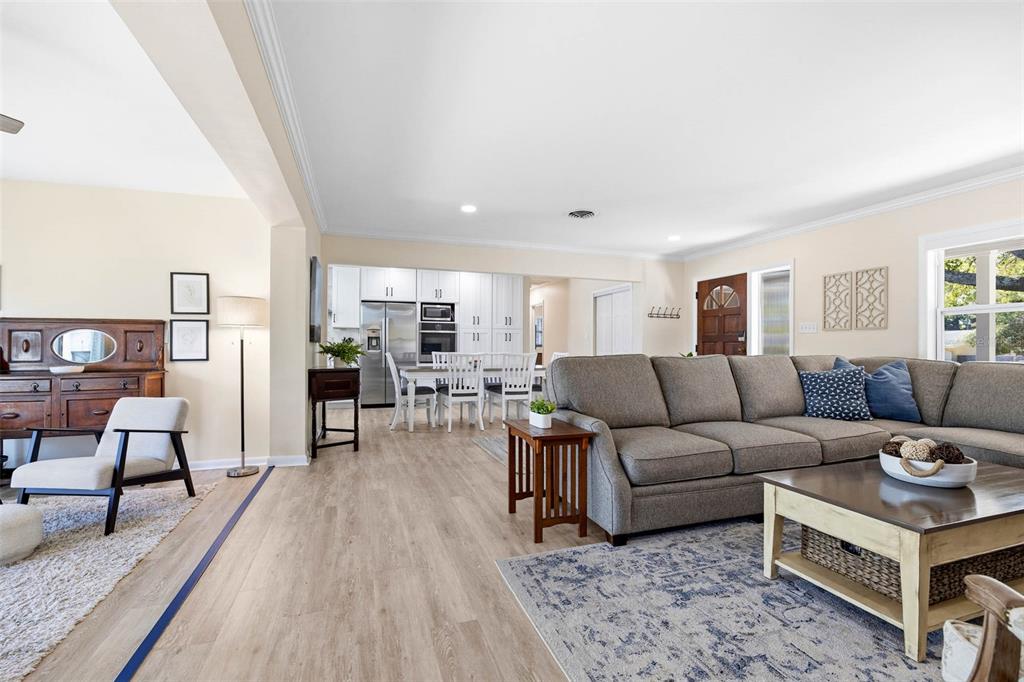 1218 Taylor Avenue Dunedin, FL 34698 - Photo 6 of 53 a living room with furniture and view of kitchen