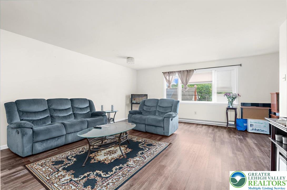326 Chestnut Street Slatington, PA 18080 - Photo 10 of 28 a living room with furniture and a wooden floor