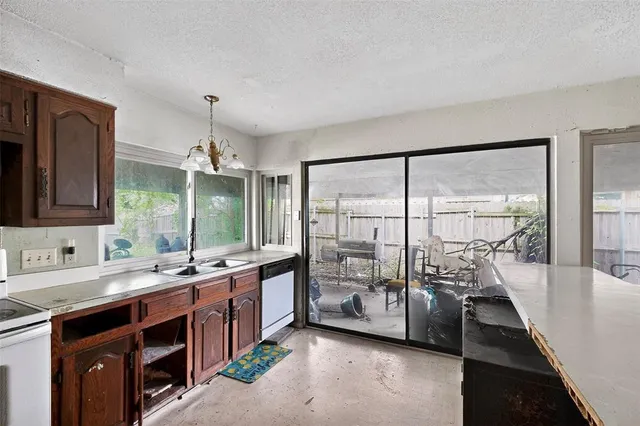 a spacious bathroom with a double vanity sink and a large mirror