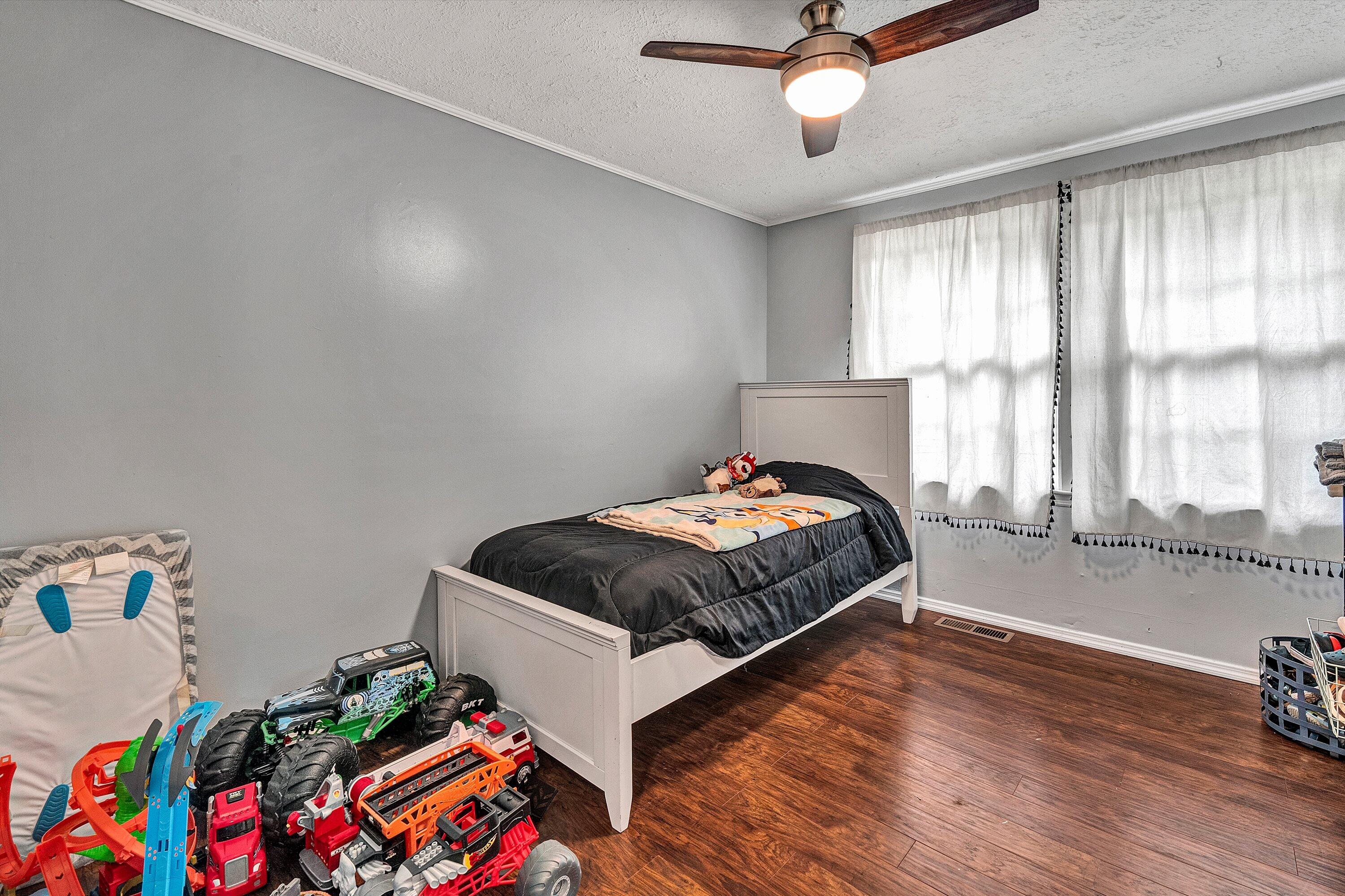 2095 Webster Road Glade Hill, VA 24092 - Photo 10 of 20 a bedroom with a bed and a window