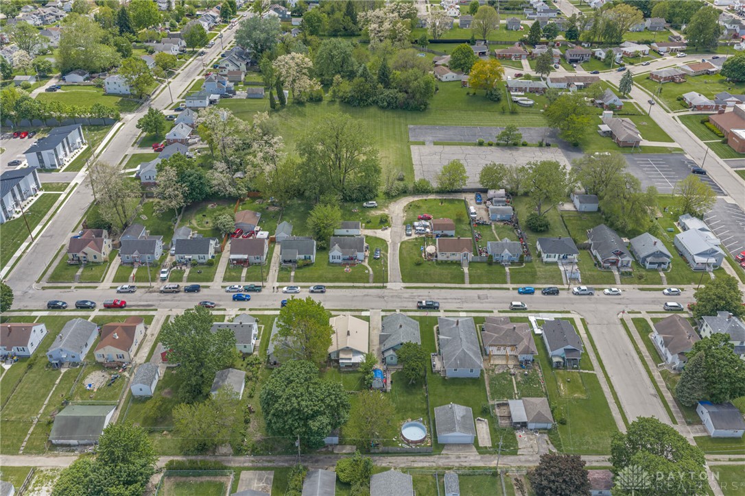 2118 Hillside Avenue Springfield, OH 45503 - Photo 28 of 28 An aerial view showcases a residential neighborhood with houses, streets, and green spaces.