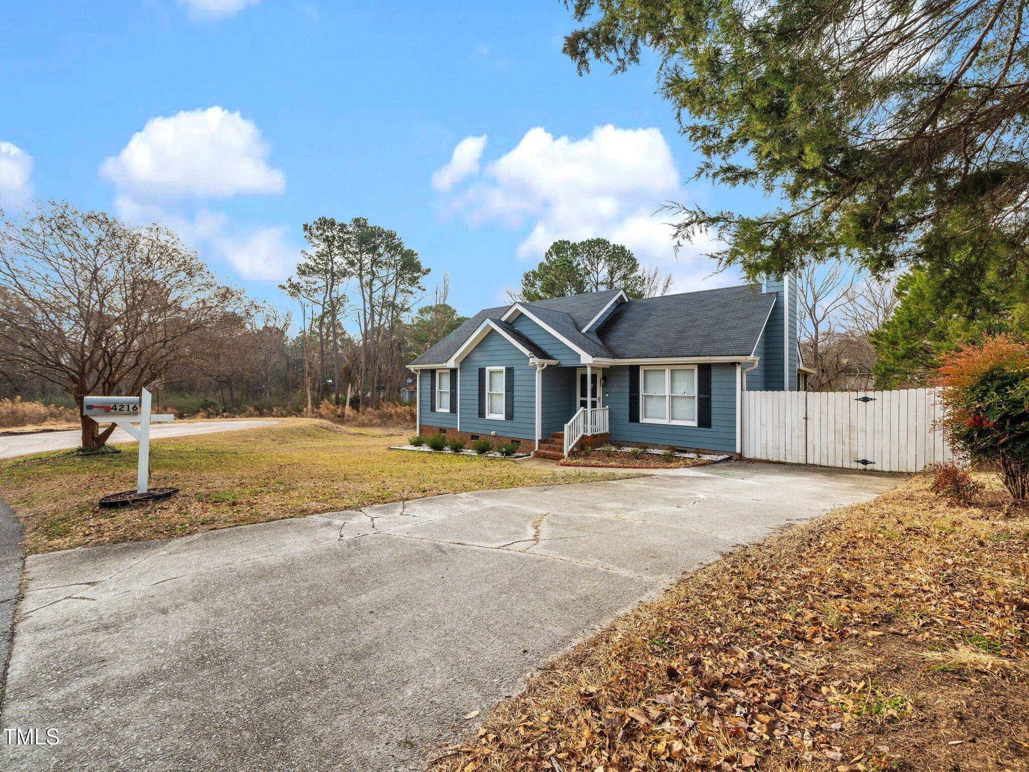 4216 Ferriday Court Raleigh, NC 27616 - Photo 2 of 29 a view of the house with entertaining space