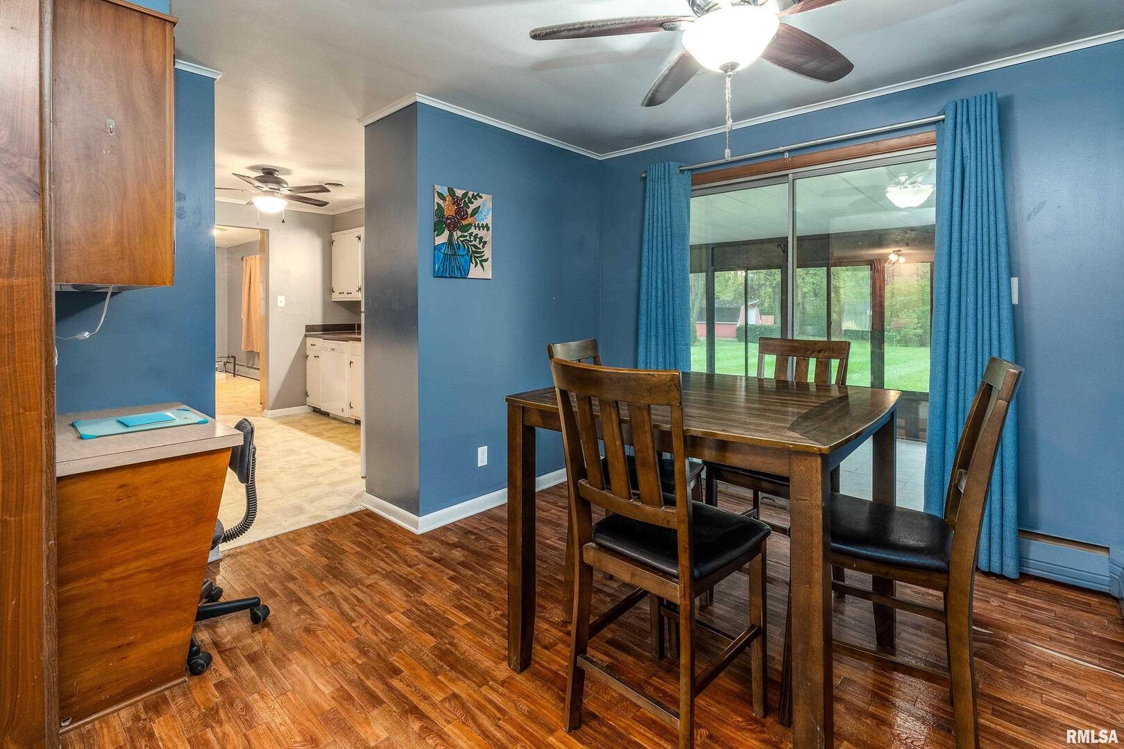 170 Melody Lane Murphysboro, IL 62966 - Photo 14 of 42 a view of a dining room with furniture window and wooden floor