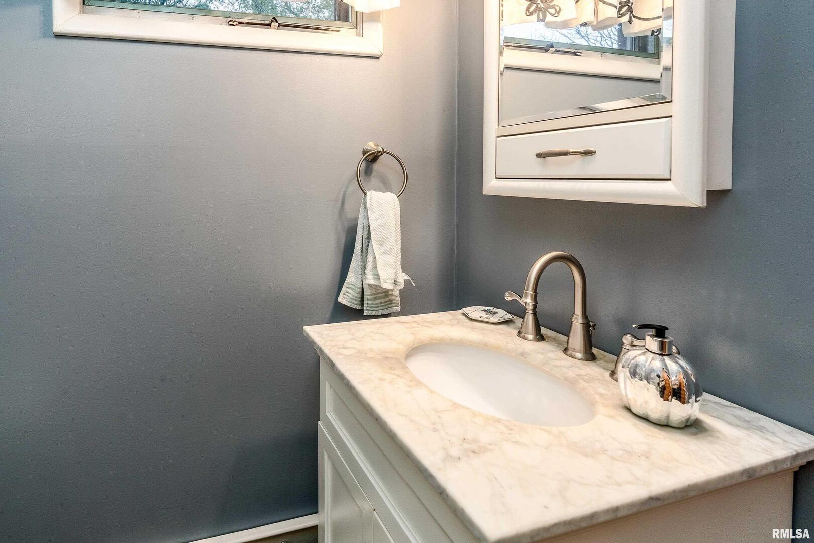 170 Melody Lane Murphysboro, IL 62966 - Photo 27 of 42 a bathroom with a sink and vanity