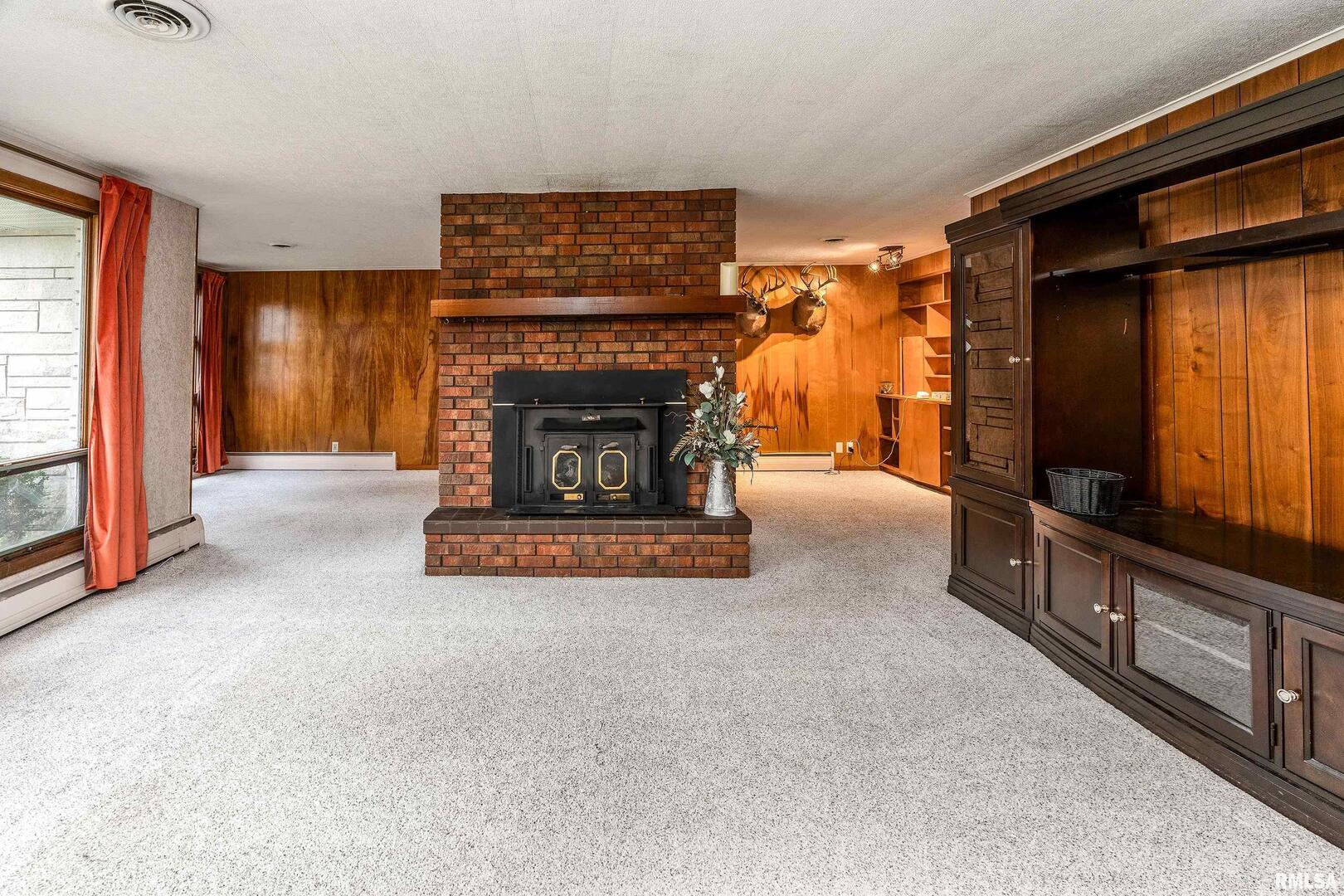 170 Melody Lane Murphysboro, IL 62966 - Photo 7 of 42 a living room with furniture and a fireplace