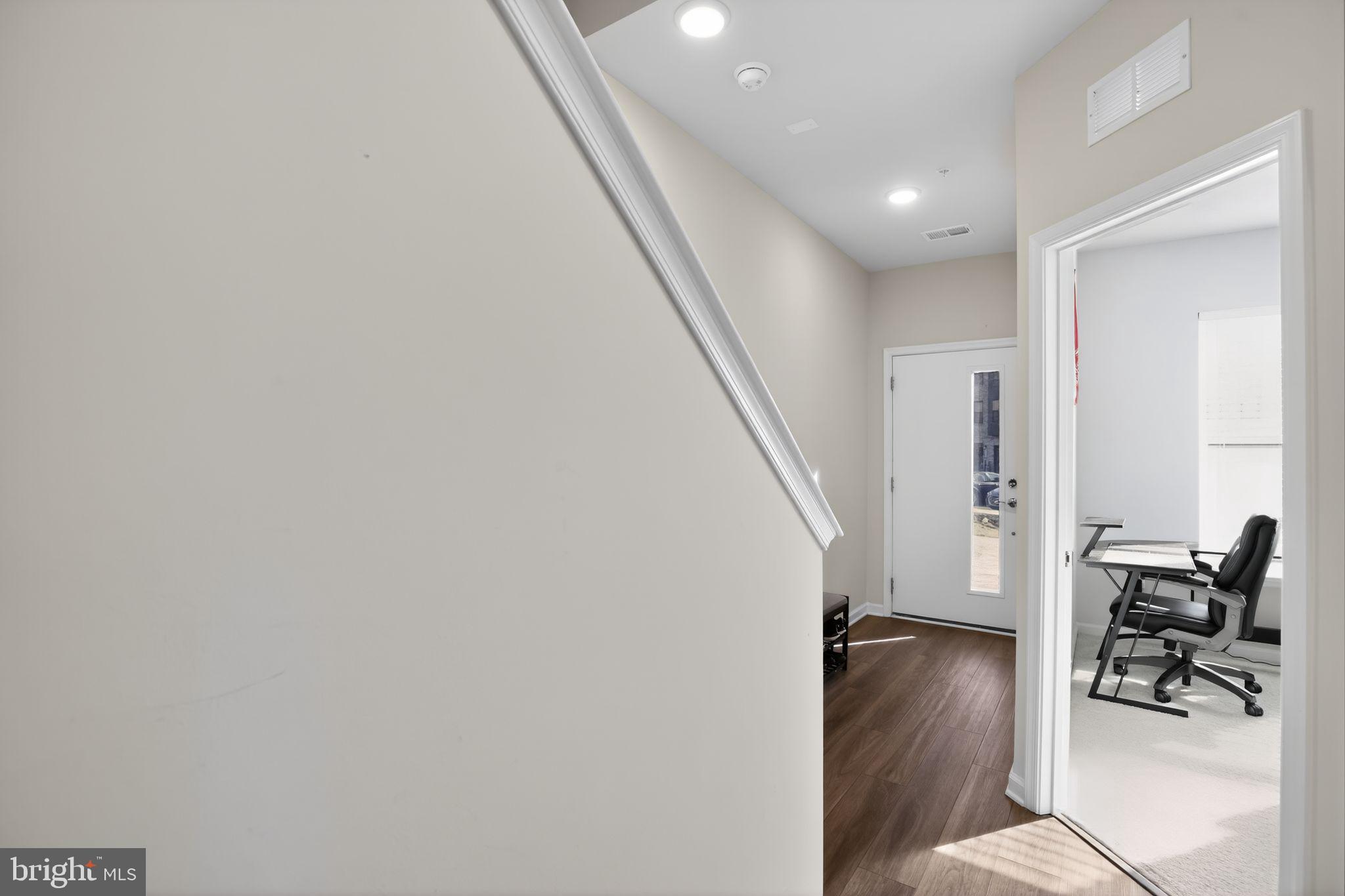 299 Freshet Lane Laurel, MD 20724 - Photo 18 of 33 a view of entryway with livingroom and wooden floor