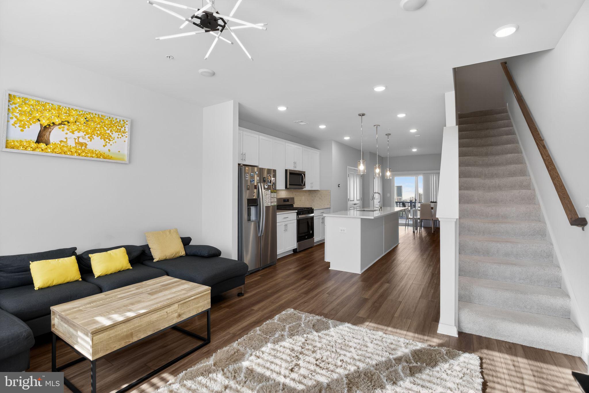 299 Freshet Lane Laurel, MD 20724 - Photo 25 of 33 a living room with furniture and kitchen view