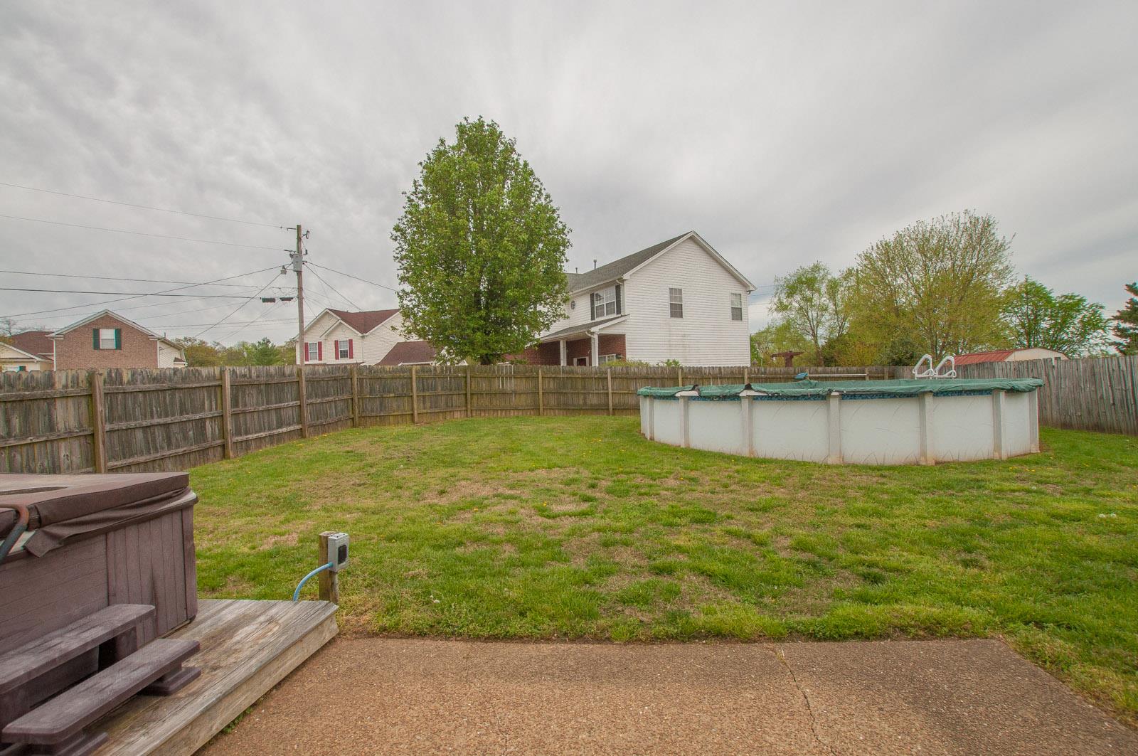 1556 Stone Hill Road Mount Juliet, TN 37122 - Photo 21 of 22 a view of a house with a yard