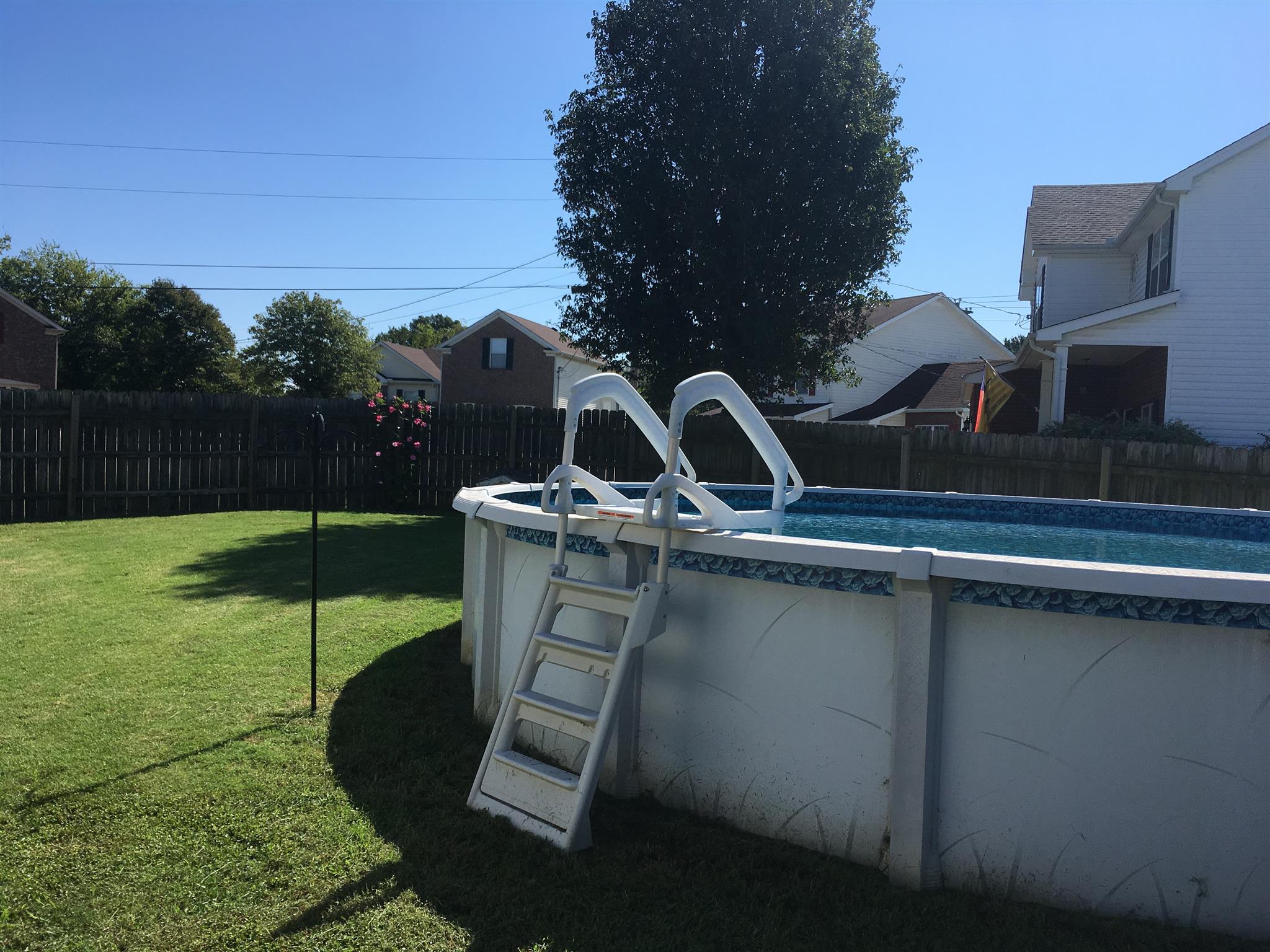 1556 Stone Hill Road Mount Juliet, TN 37122 - Photo 22 of 22 a view of a chair and table in the backyard
