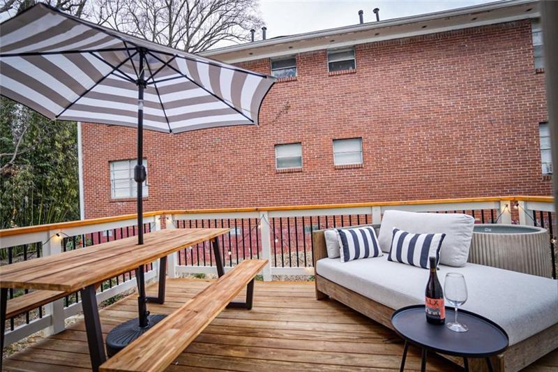 829 Barnett Street Northeast Atlanta, GA 30306 - Photo 36 of 41 a view of a balcony with furniture