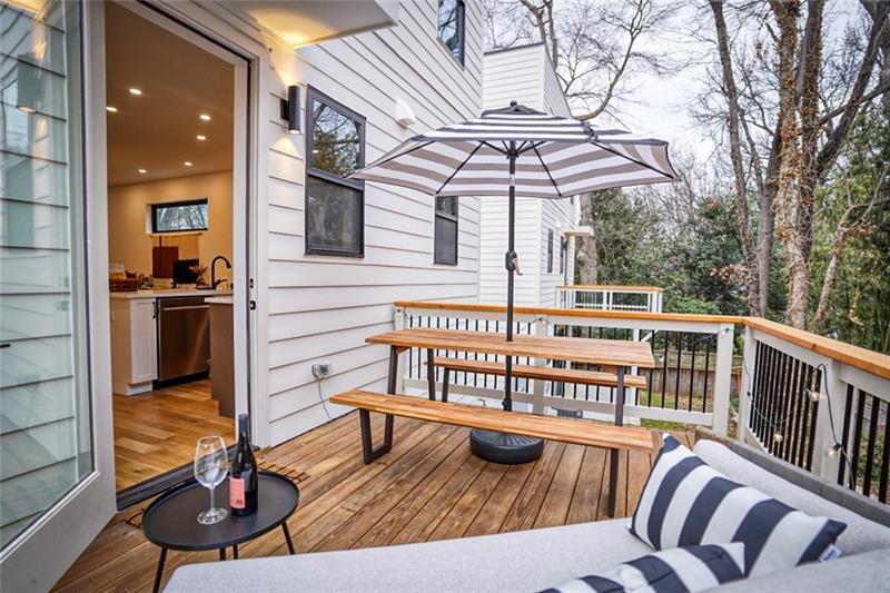 829 Barnett Street Northeast Atlanta, GA 30306 - Photo 37 of 41 a view of a balcony with furniture