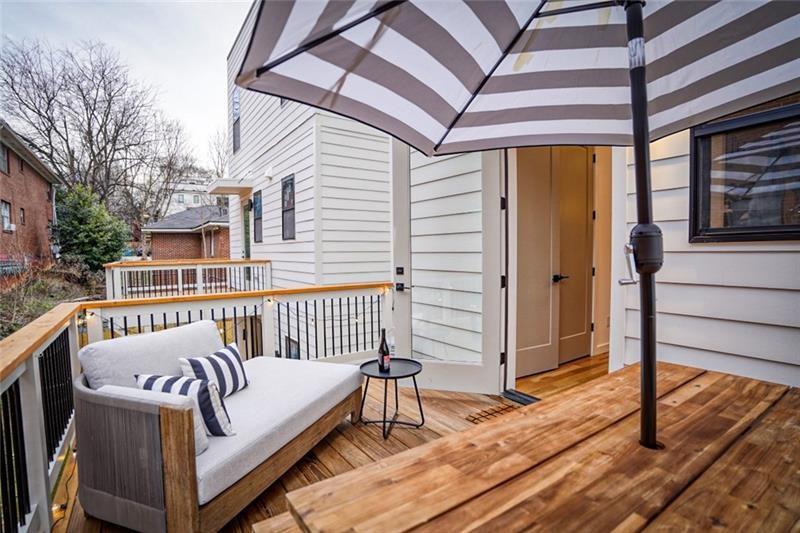 829 Barnett Street Northeast Atlanta, GA 30306 - Photo 38 of 41 a view of a balcony with furniture