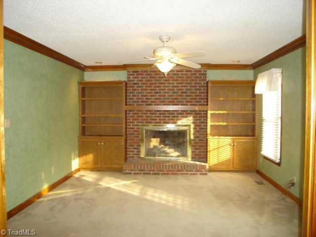 305 Ridgeland Drive High Point, NC 27262 - Photo 4 of 8 Other. Den with gas logs
