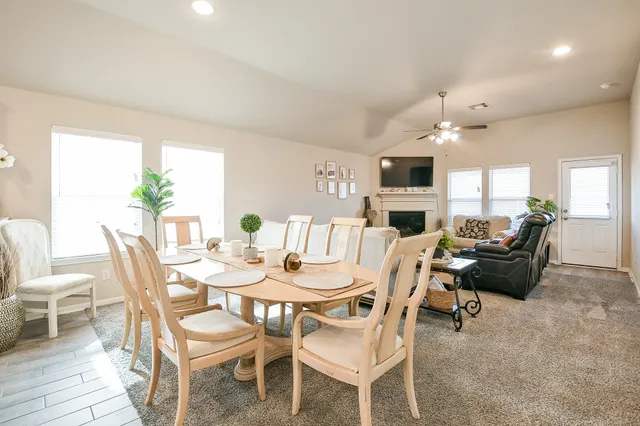 a view of a dining room with furniture