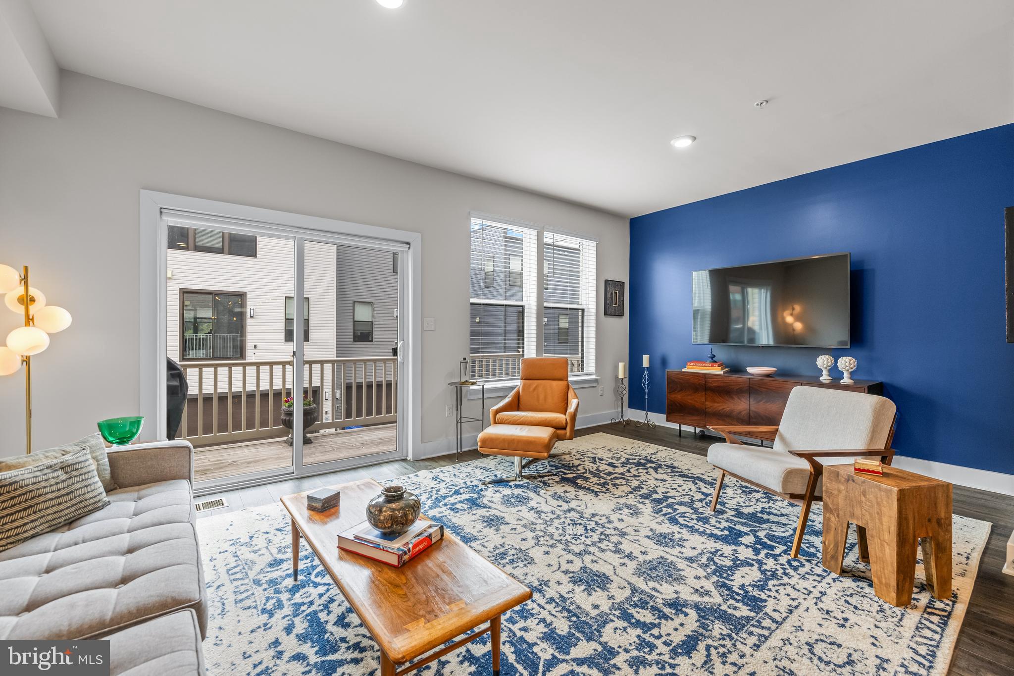 4307 La Plata Avenue Baltimore, MD 21211 - Photo 11 of 54 a living room with furniture and a flat screen tv