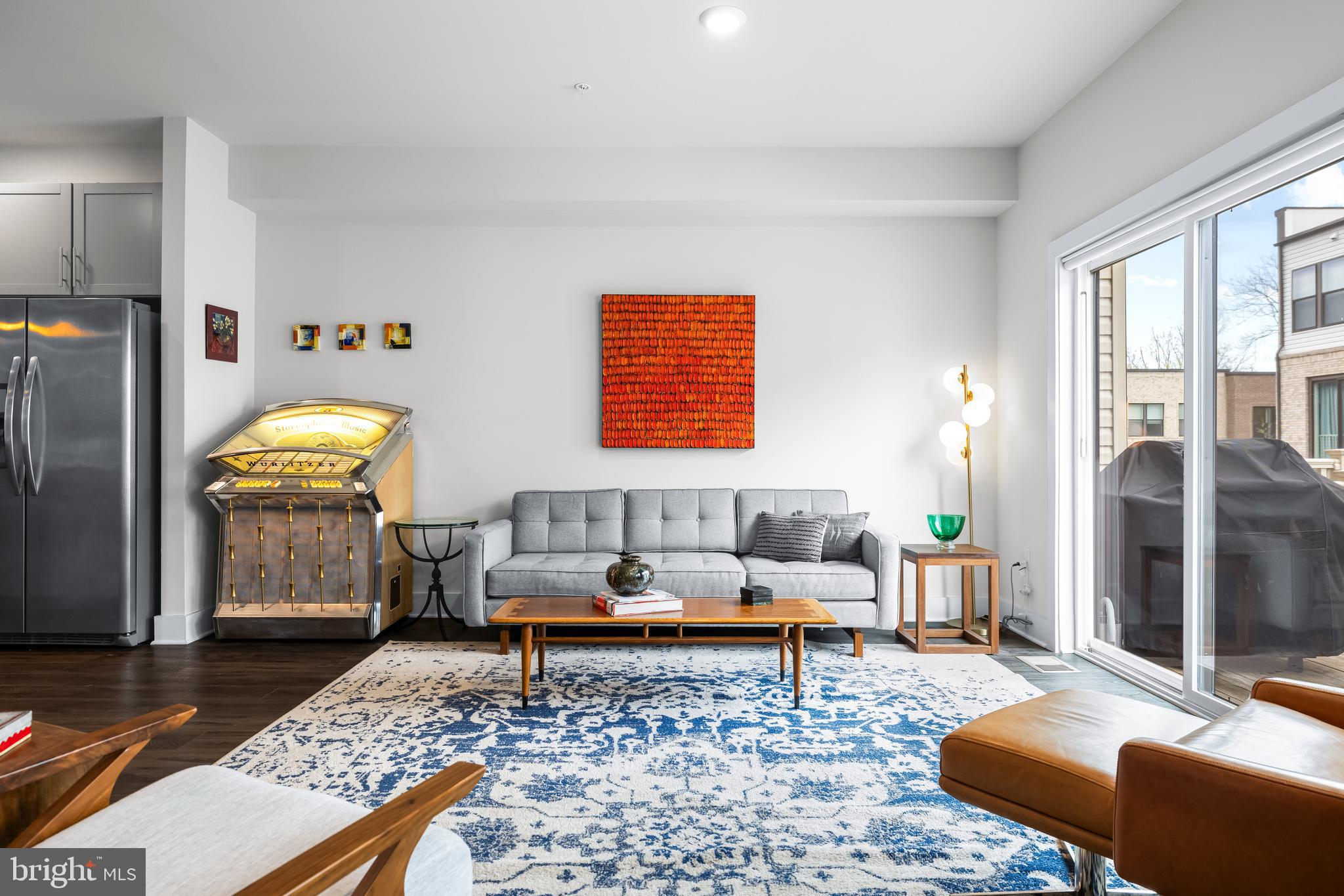4307 La Plata Avenue Baltimore, MD 21211 - Photo 17 of 54 a living room with furniture and a rug