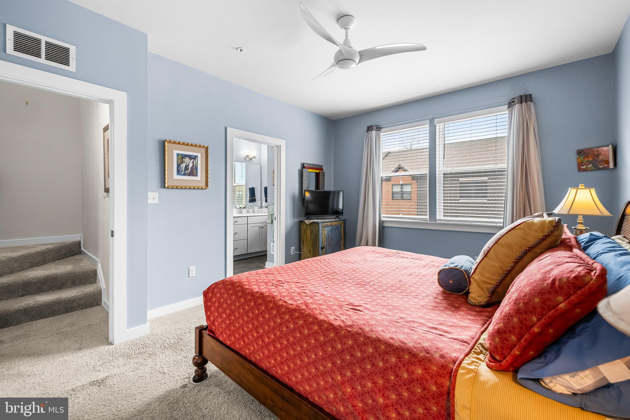 4307 La Plata Avenue Baltimore, MD 21211 - Photo 36 of 54 a bedroom with a bed and a refrigerator