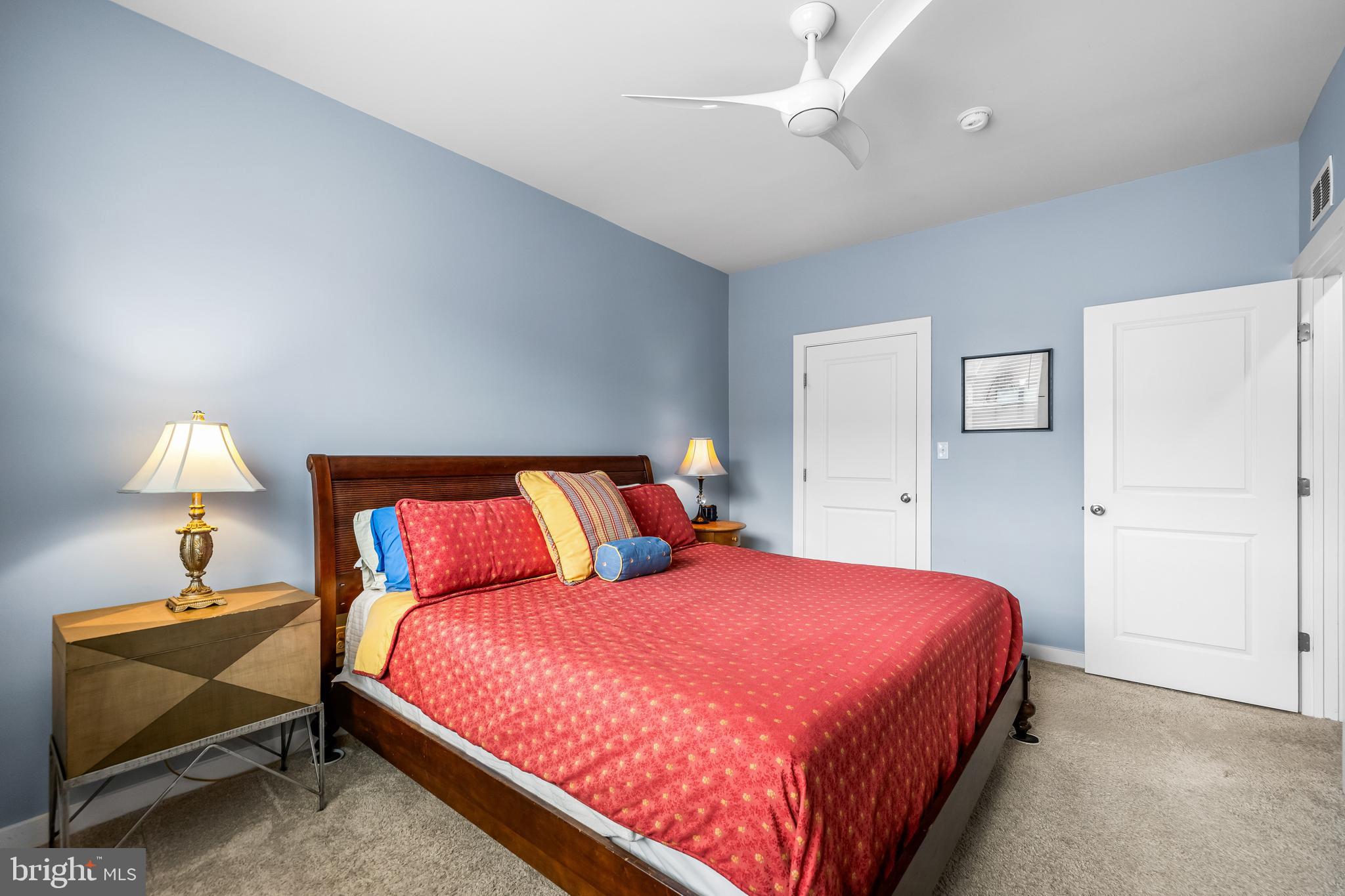 4307 La Plata Avenue Baltimore, MD 21211 - Photo 37 of 54 a bedroom with a bed and a lamp