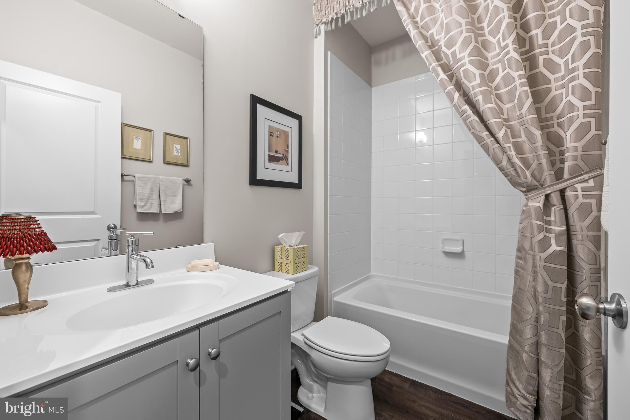 4307 La Plata Avenue Baltimore, MD 21211 - Photo 40 of 54 a bathroom with a sink toilet and bathtub