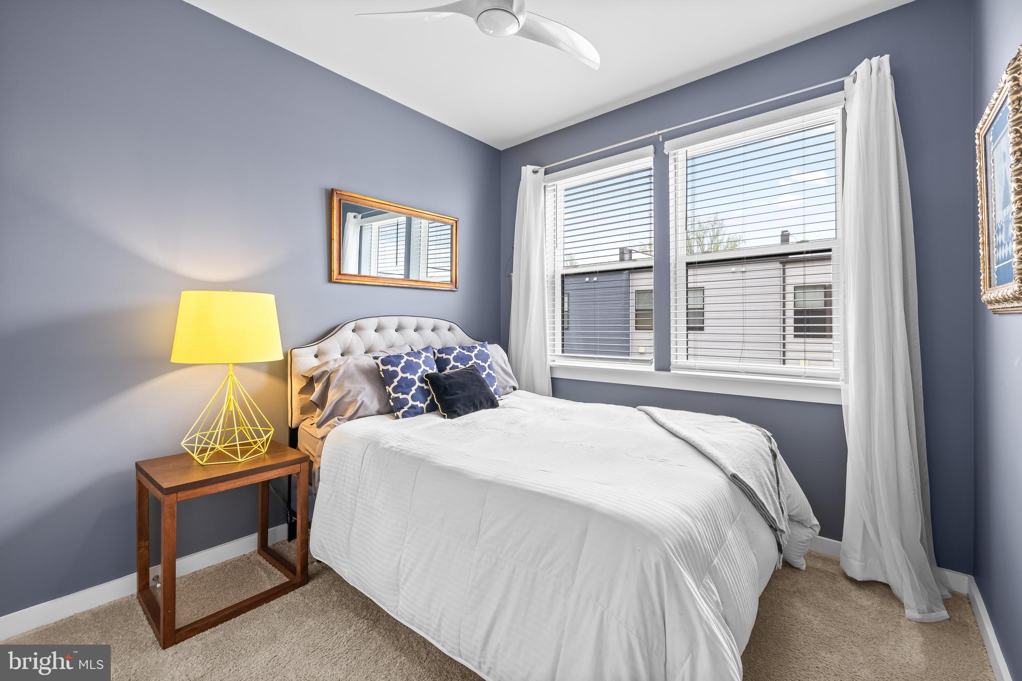 4307 La Plata Avenue Baltimore, MD 21211 - Photo 41 of 54 a bedroom with a bed and a window