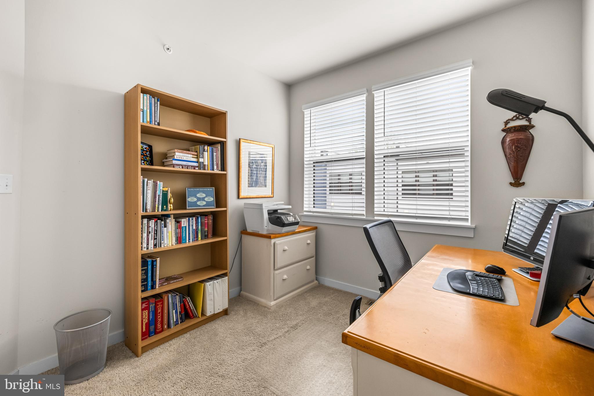 4307 La Plata Avenue Baltimore, MD 21211 - Photo 44 of 54 a bedroom with furniture and a book shelf