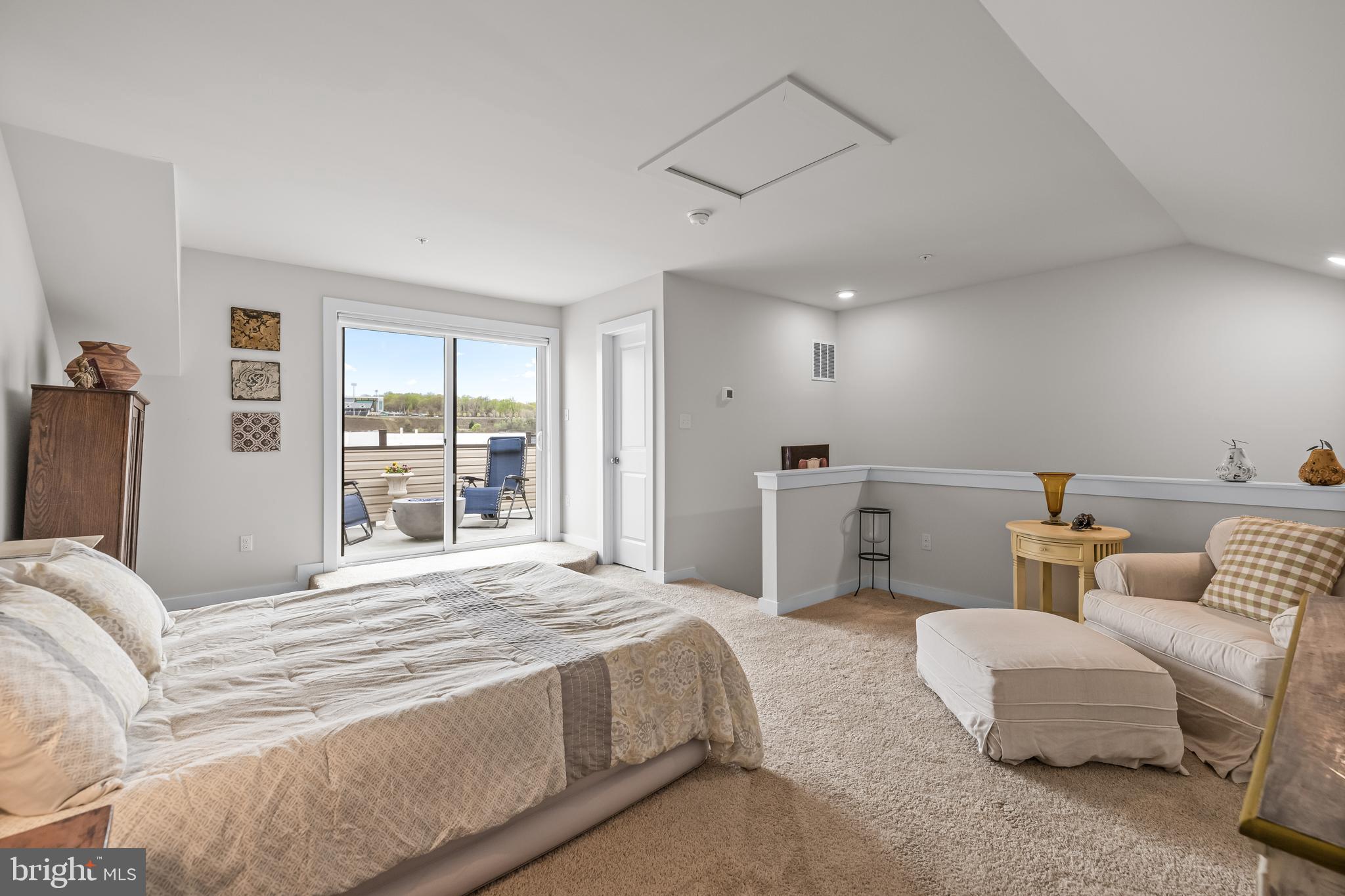 4307 La Plata Avenue Baltimore, MD 21211 - Photo 46 of 54 a bedroom with a bed and a large window