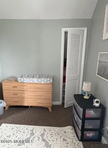 a view of livingroom with furniture and windows