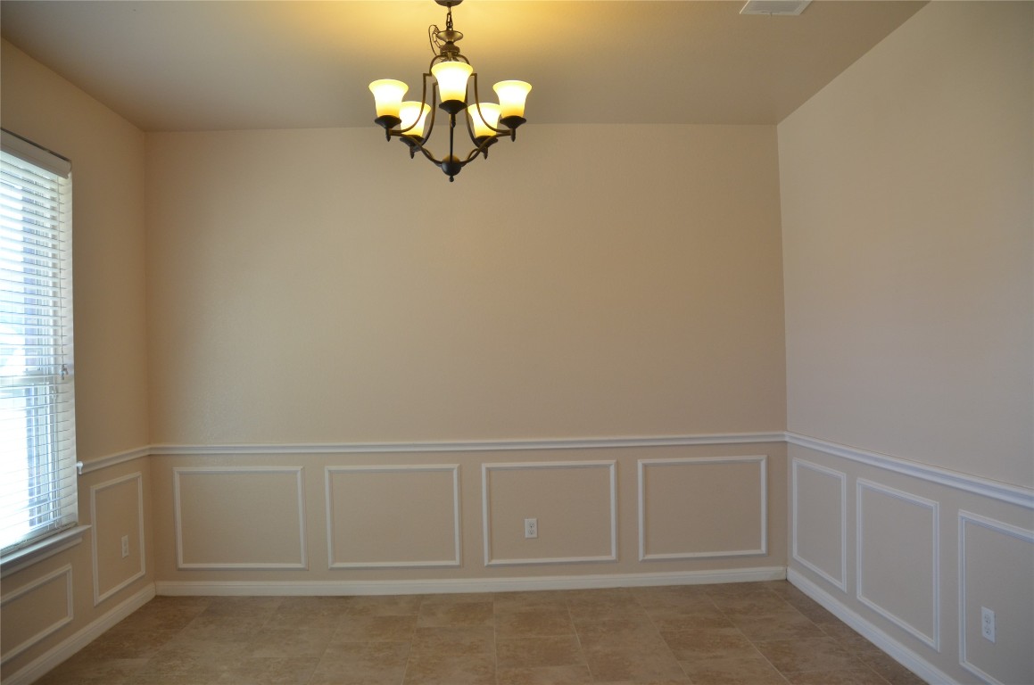 8528 Reggio Street Round Rock, TX 78665 - Photo 4 of 27 an empty room with a window