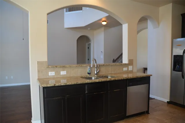 a bathroom with sinks and a vanity