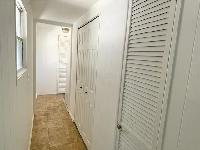 a view of a bathroom from a hallway