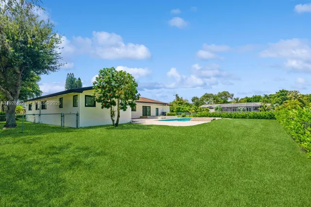 a view of a house with a big yard