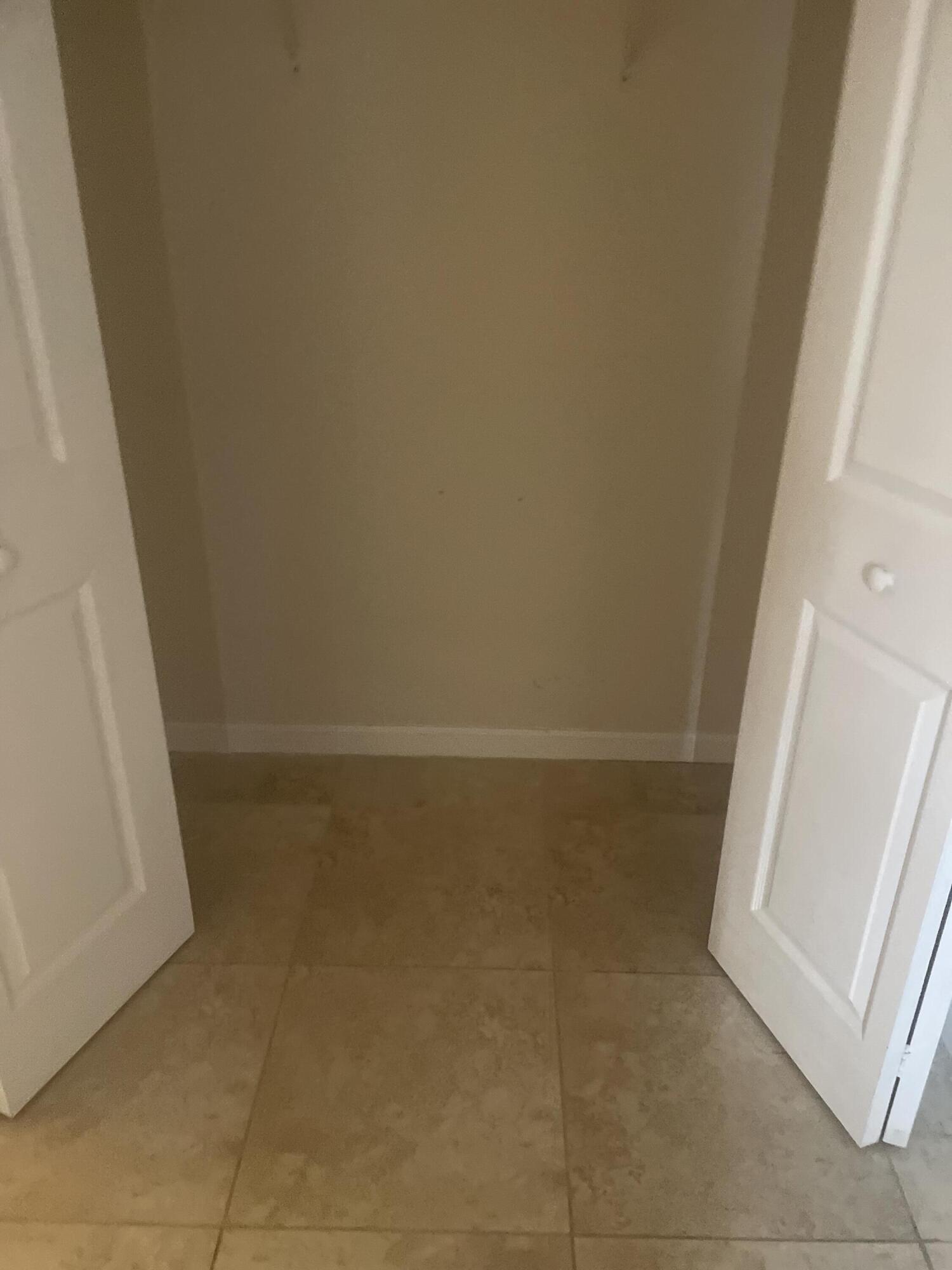 710 Northeast 7th Street, Unit 103 Boynton Beach, FL 33435 - Photo 11 of 12 a view of room with window