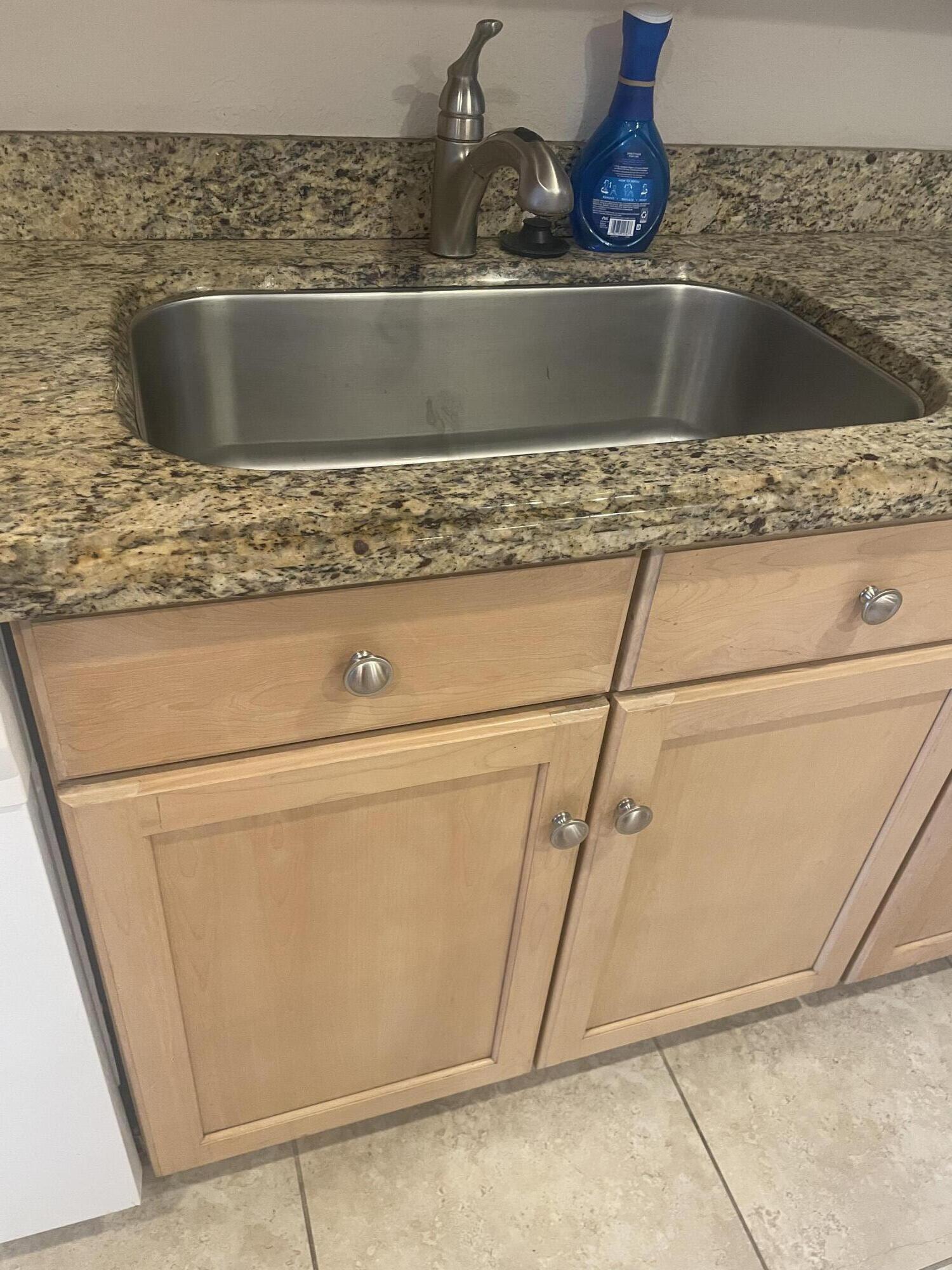 710 Northeast 7th Street, Unit 103 Boynton Beach, FL 33435 - Photo 8 of 12 a view of washer and dryer