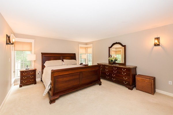 8 Old Town Road Beverly, MA 01915 - Photo 11 of 24 a bed room with a bed and a dresser