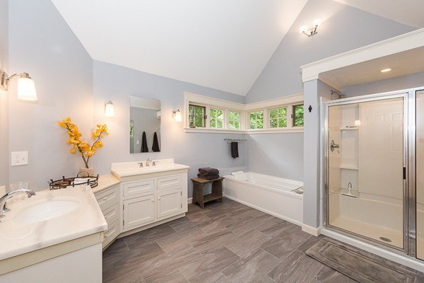 8 Old Town Road Beverly, MA 01915 - Photo 12 of 24 a bathroom with a tub sink and mirror