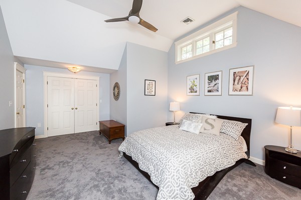 8 Old Town Road Beverly, MA 01915 - Photo 14 of 24 a bedroom with a bed and wooden floor