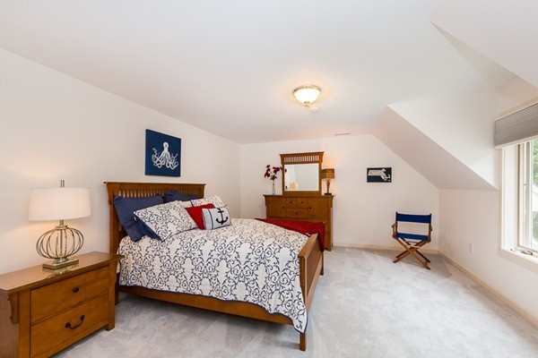 8 Old Town Road Beverly, MA 01915 - Photo 18 of 24 a bedroom with a bed and wooden floor