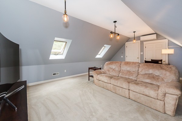 8 Old Town Road Beverly, MA 01915 - Photo 19 of 24 a living room with furniture and a flat screen tv