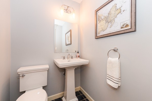 8 Old Town Road Beverly, MA 01915 - Photo 20 of 24 a bathroom with a toilet a sink and mirror