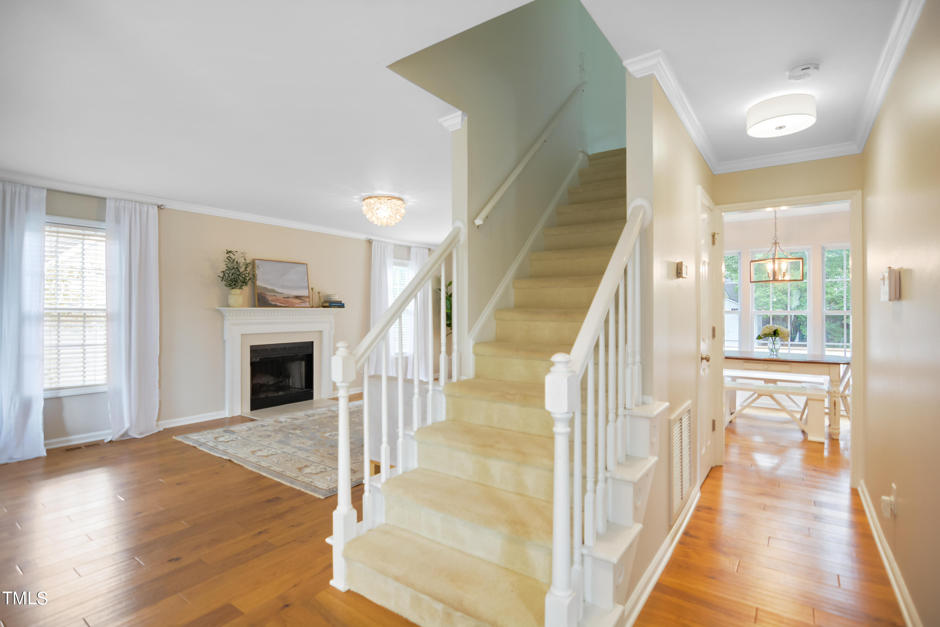 2515 Tryon Pines Drive Raleigh, NC 27603 - Photo 2 of 27 a view of entryway and hall with wooden floor