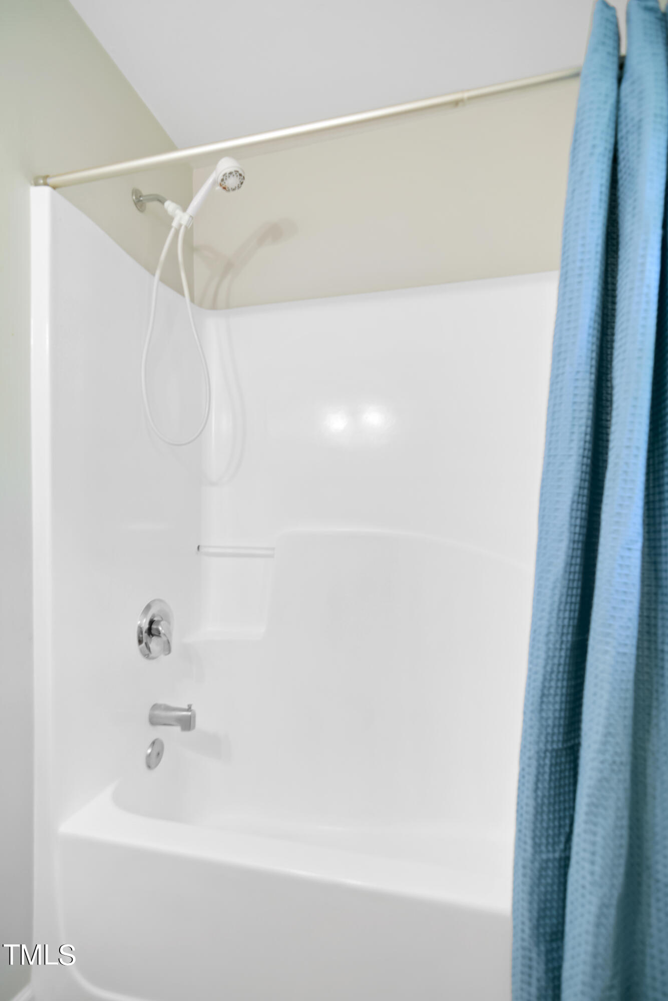 2515 Tryon Pines Drive Raleigh, NC 27603 - Photo 21 of 27 a bathroom with a shower and a bath tub