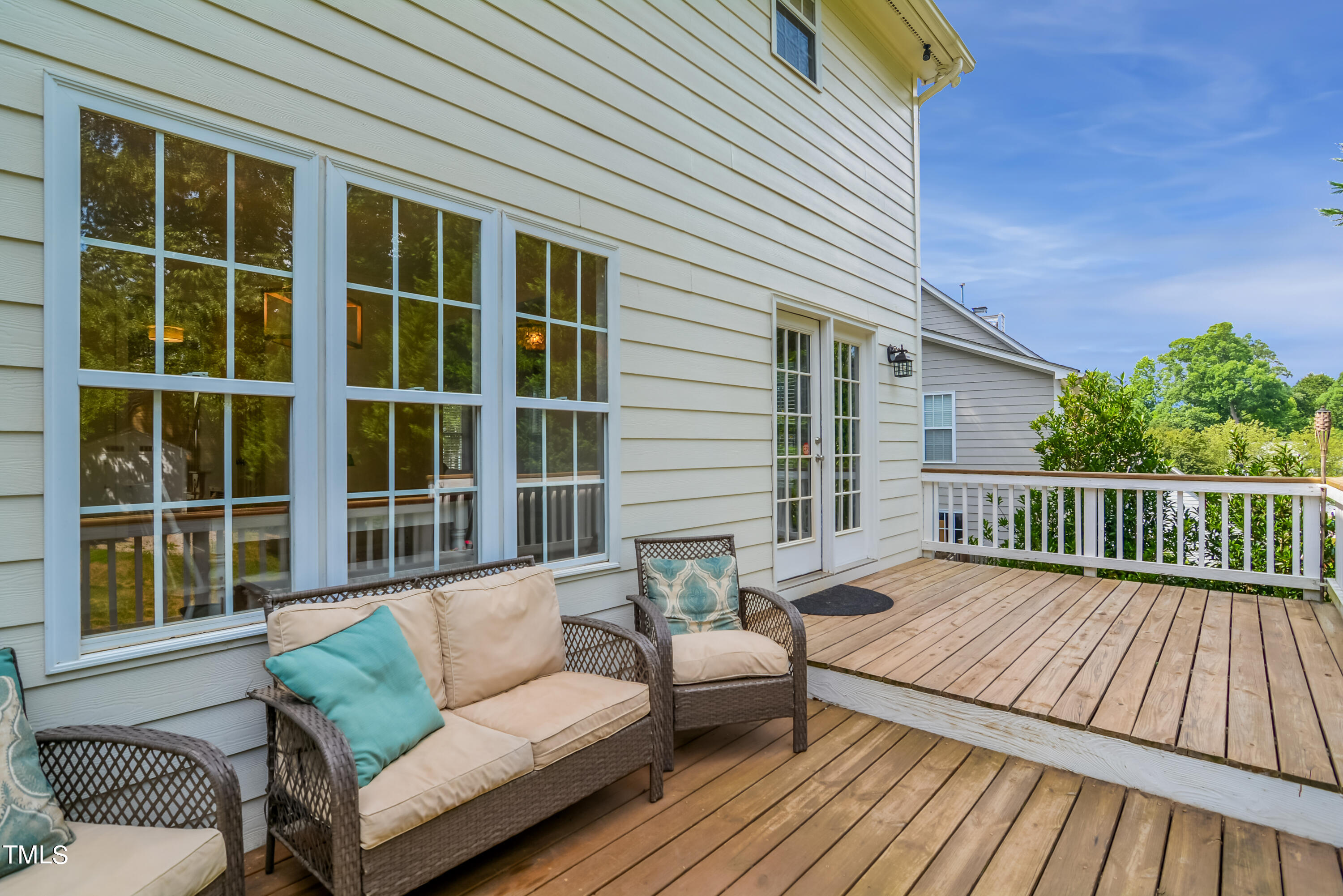 2515 Tryon Pines Drive Raleigh, NC 27603 - Photo 22 of 27 a balcony with wooden floor and furniture