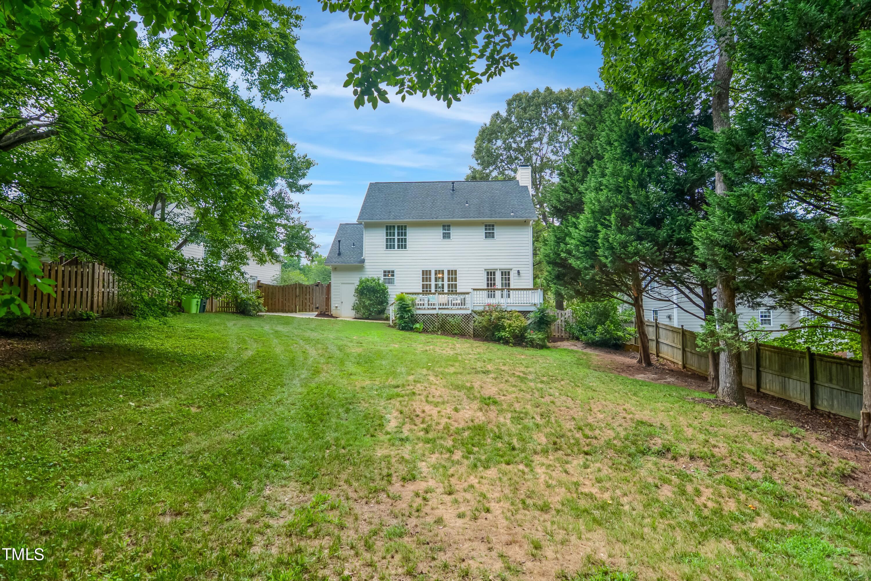 2515 Tryon Pines Drive Raleigh, NC 27603 - Photo 27 of 27 a view of a house with a back yard