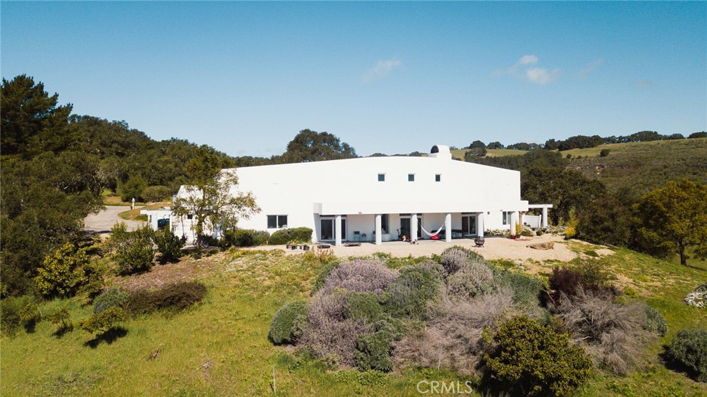 1800 Atascadero Road Morro Bay, CA 93442 - Photo 11 of 55 a view of a house with a yard