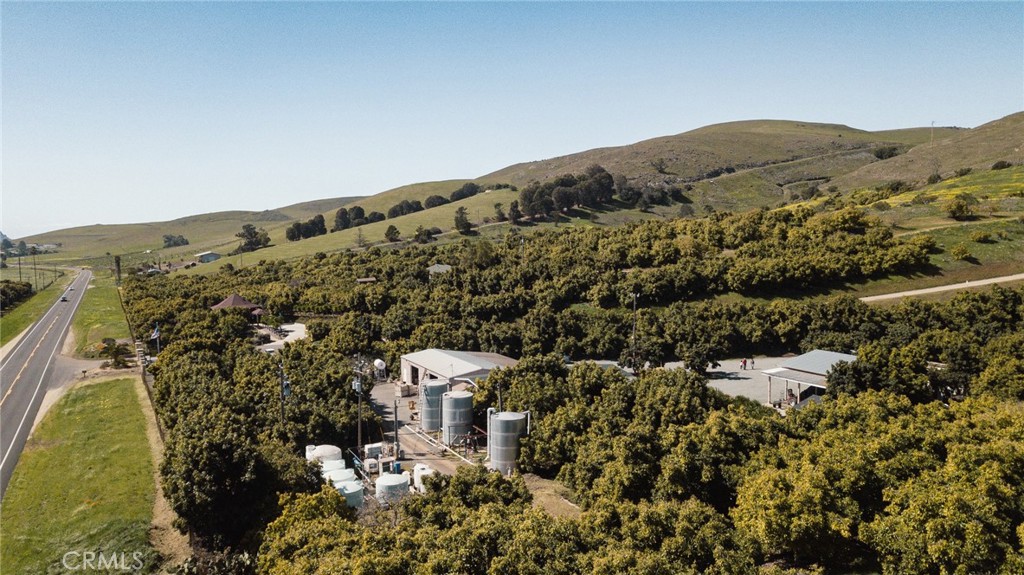 1800 Atascadero Road Morro Bay, CA 93442 - Photo 32 of 55 a view of a large building with a mountain in the background