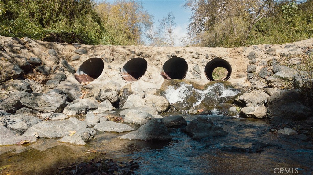 1800 Atascadero Road Morro Bay, CA 93442 - Photo 48 of 55 a view of a backyard with wooden fence