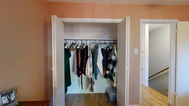 a view of a patio with table and chairs and potted plants