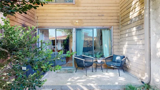 a view of a backyard with plants