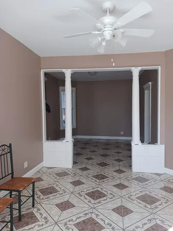 a view of a hallway with a workspace