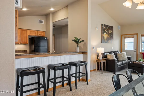 a view of a dining room with furniture